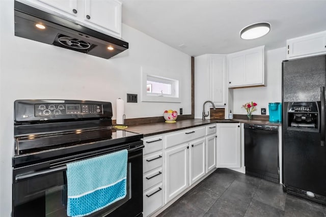 kitchen with dark countertops, black appliances, under cabinet range hood, white cabinetry, and a sink