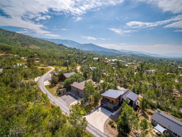 drone / aerial view featuring a mountain view