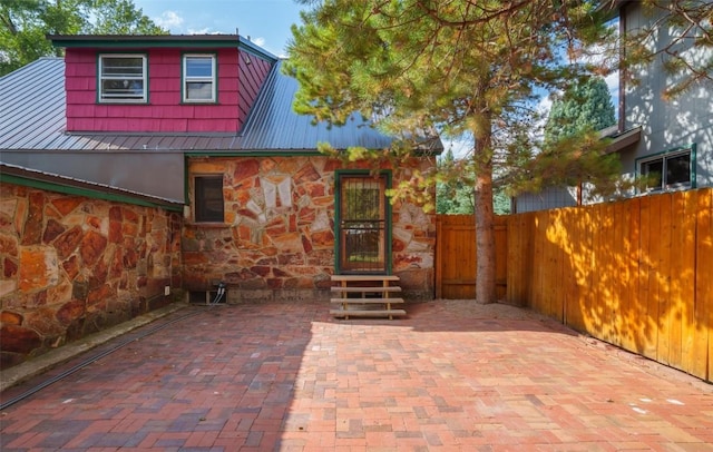 rear view of property with a patio