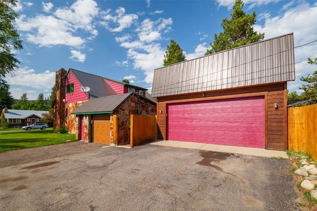 view of front facade with an outbuilding