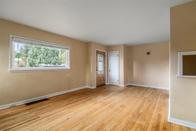 empty room featuring light wood-type flooring