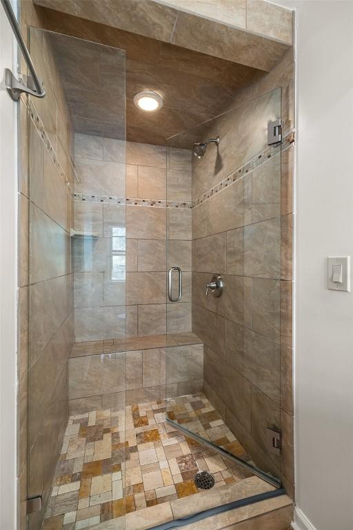 bathroom with an enclosed shower