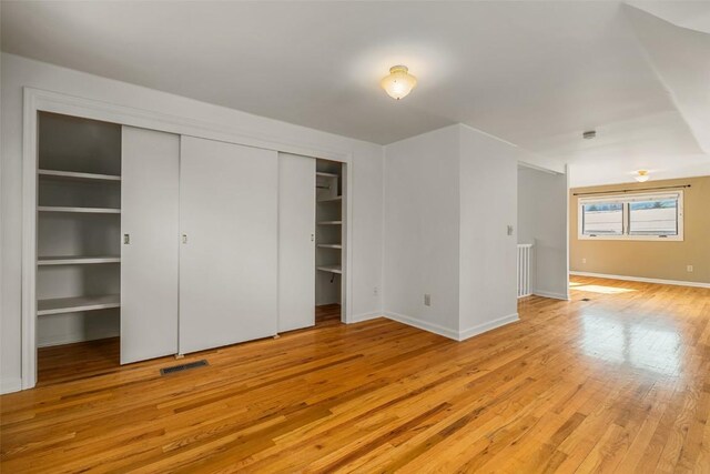 unfurnished bedroom with light hardwood / wood-style flooring