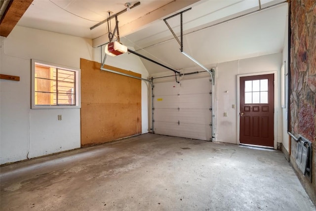 garage featuring a garage door opener