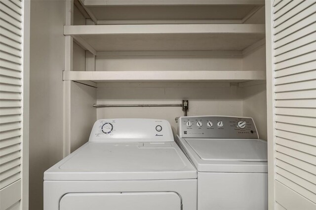 washroom featuring independent washer and dryer