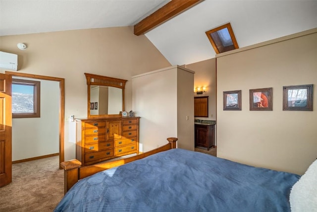 carpeted bedroom featuring ensuite bathroom, vaulted ceiling with beams, and a wall mounted AC