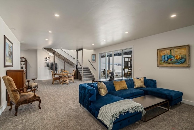 living area featuring stairs, carpet, baseboards, and recessed lighting