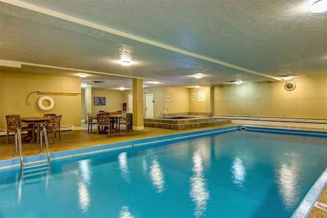 view of swimming pool featuring an indoor hot tub