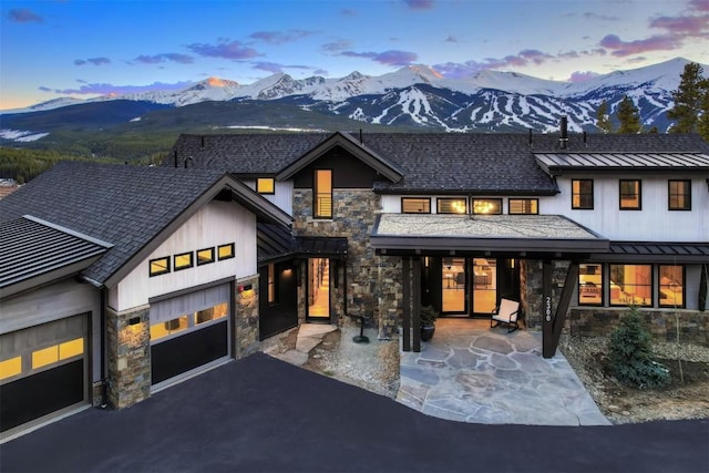 view of front of home featuring a mountain view