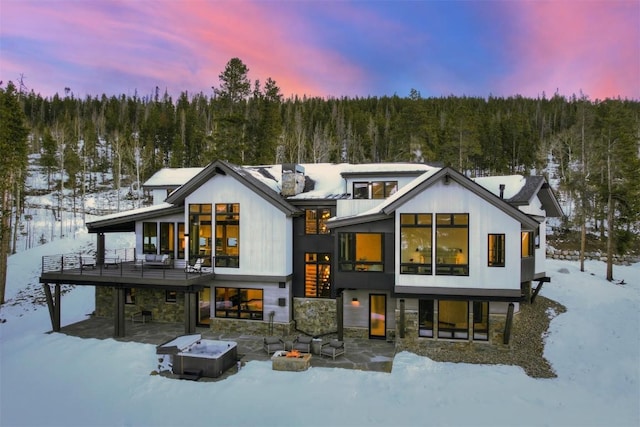 view of snow covered house