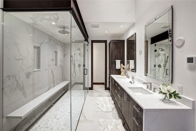 bathroom with vanity and an enclosed shower