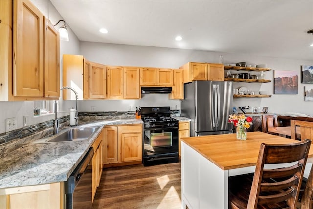 kitchen with dark hardwood / wood-style flooring, light stone counters, sink, black appliances, and light brown cabinets