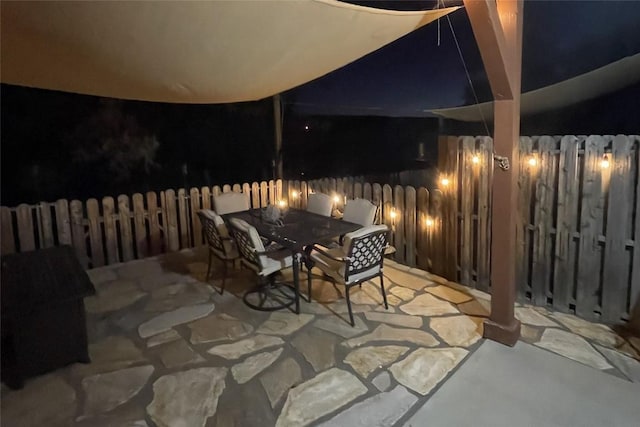 view of patio at twilight