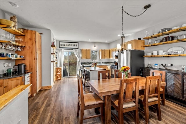 dining room with dark hardwood / wood-style floors