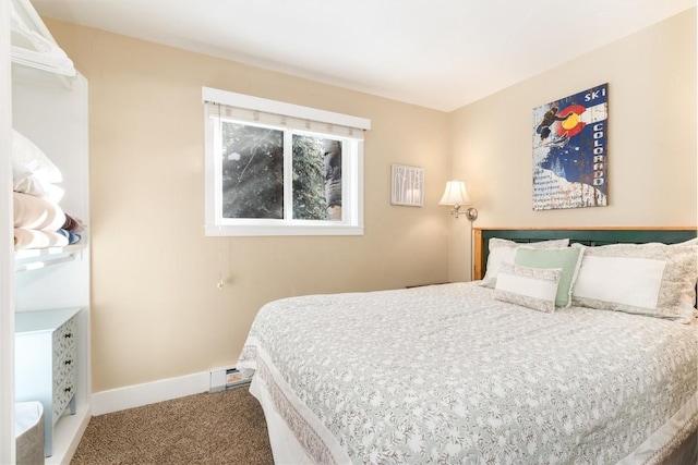 bedroom featuring carpet and a baseboard radiator