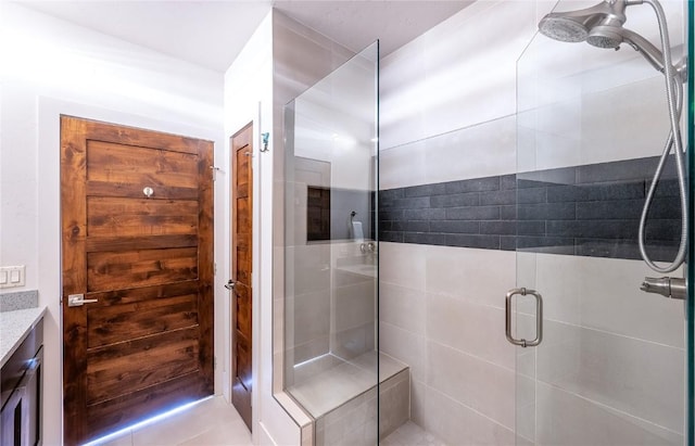 bathroom featuring vanity and walk in shower