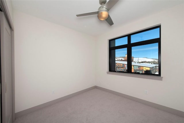 empty room featuring ceiling fan