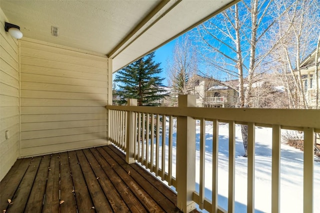 view of snow covered deck