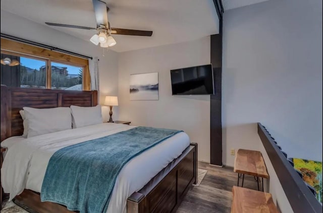 bedroom with a ceiling fan and wood finished floors