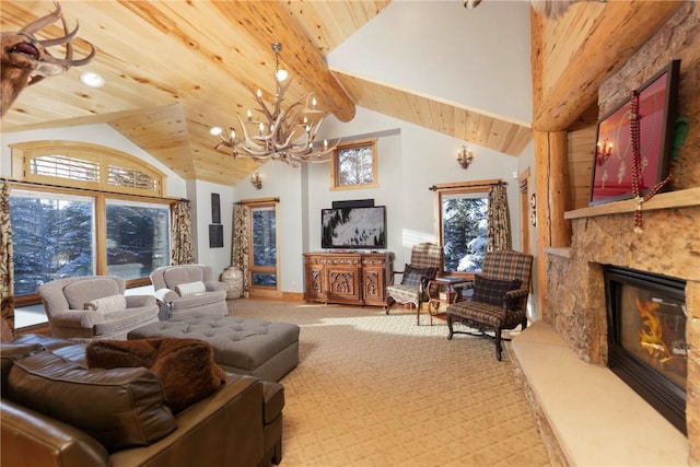 carpeted living room with a chandelier, wood ceiling, a stone fireplace, and high vaulted ceiling