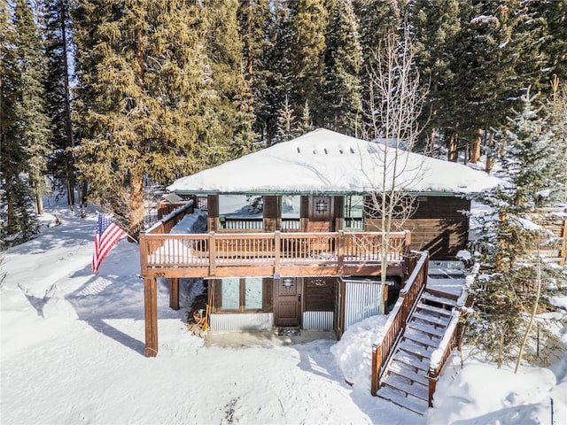 view of front of property featuring a wooden deck