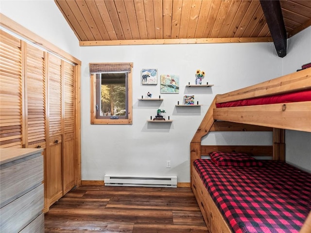 bedroom featuring dark wood-type flooring, vaulted ceiling, a baseboard radiator, wooden ceiling, and a closet