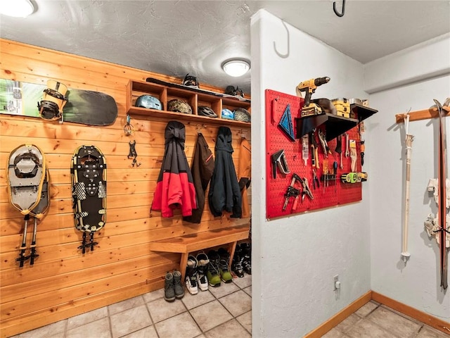 mudroom featuring light tile patterned floors