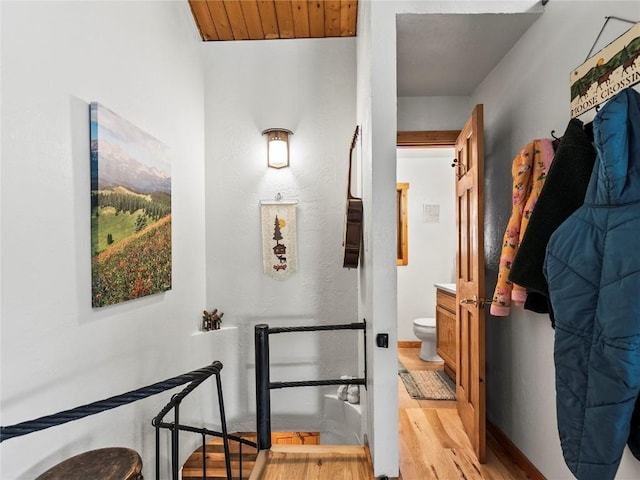 hallway with light wood-type flooring