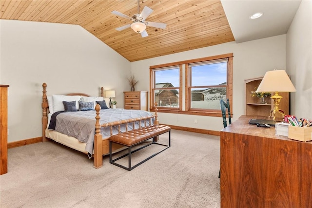 bedroom with ceiling fan, wooden ceiling, light colored carpet, baseboards, and vaulted ceiling