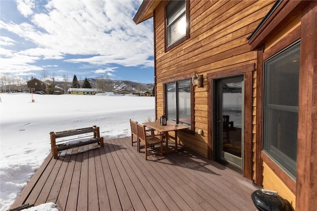 view of snow covered deck