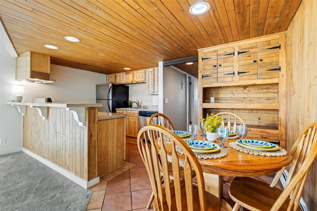 dining area featuring light tile patterned floors, recessed lighting, wooden ceiling, and wet bar