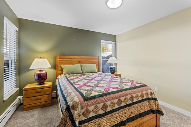 carpeted bedroom with baseboards and baseboard heating