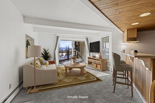 living area with a baseboard radiator, beam ceiling, carpet, and wood ceiling