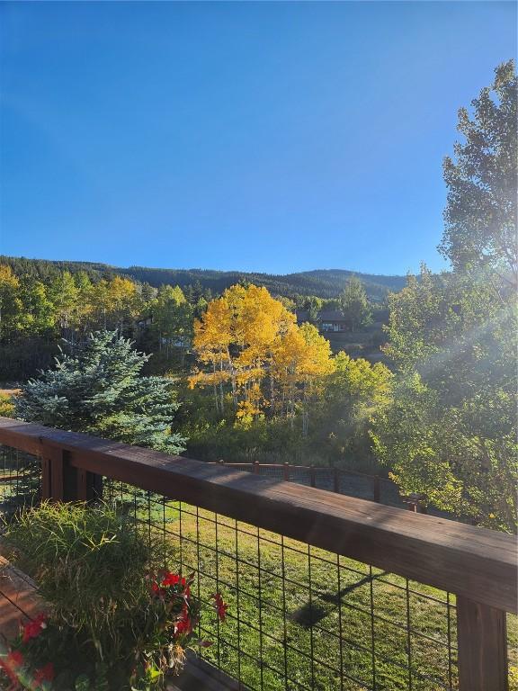 balcony with a wooded view