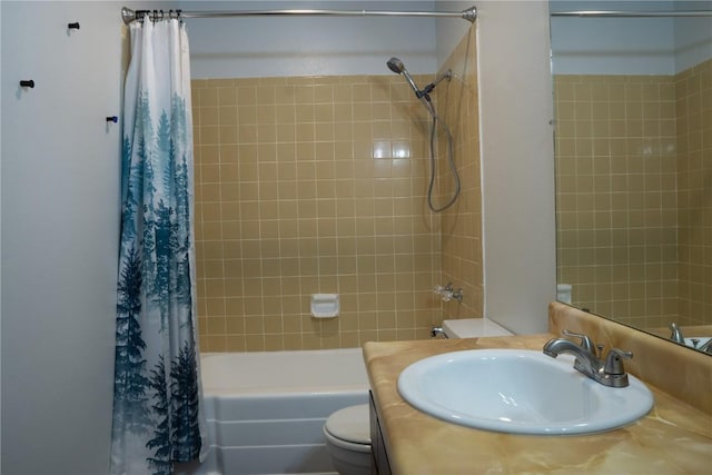 full bathroom featuring vanity, shower / bath combination with curtain, and toilet