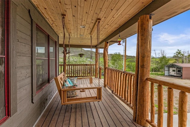 wooden deck featuring a porch