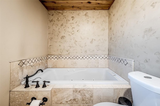 full bathroom with toilet, wooden ceiling, a whirlpool tub, and wallpapered walls