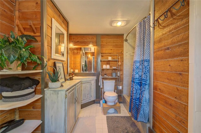 full bath featuring toilet, wooden walls, a shower with curtain, and vanity