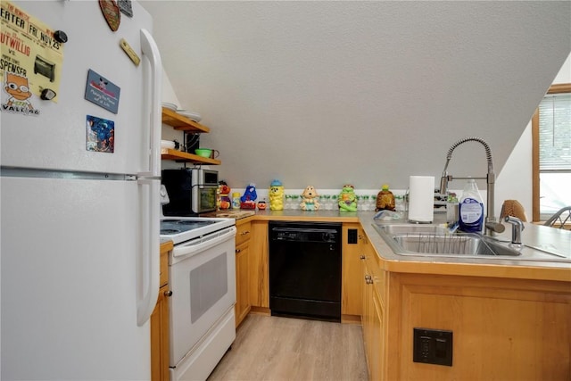 kitchen featuring light wood-type flooring, sink, white appliances, and kitchen peninsula