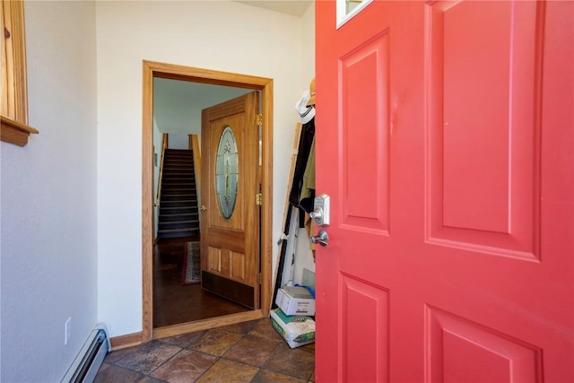 foyer entrance with baseboard heating