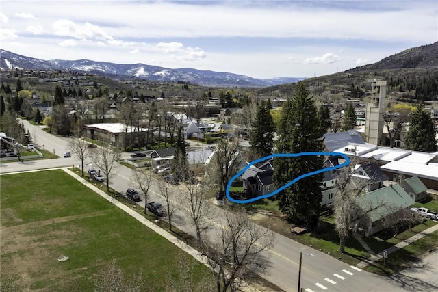 drone / aerial view featuring a mountain view