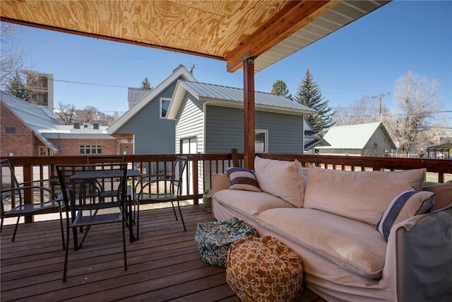 wooden deck featuring an outdoor living space