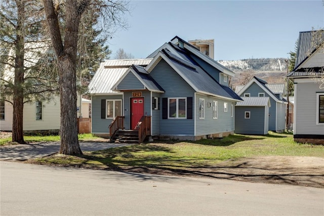 bungalow with a front yard