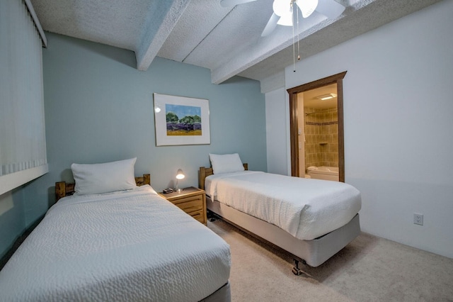 bedroom with ceiling fan, beam ceiling, carpet, and a textured ceiling