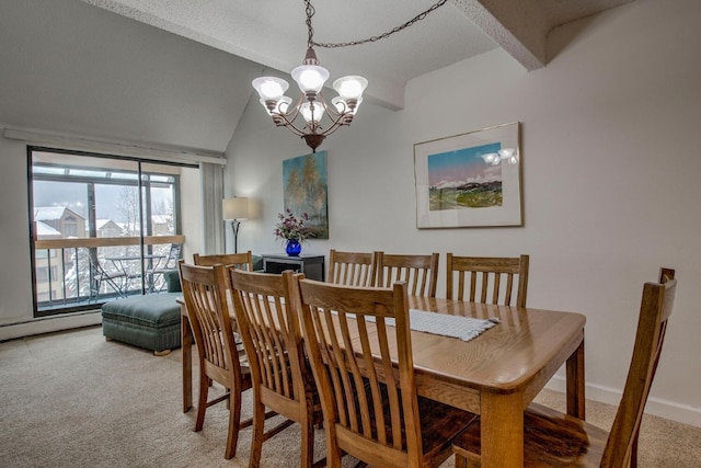 dining room featuring lofted ceiling, carpet, and a notable chandelier