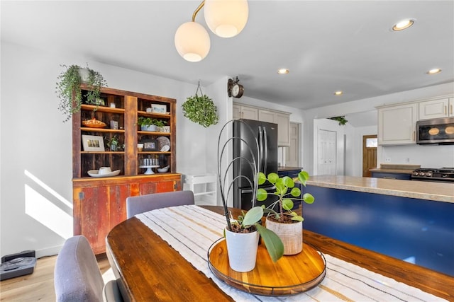 dining room featuring light hardwood / wood-style flooring