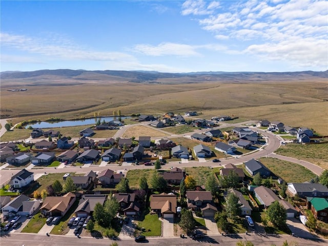 aerial view with a water and mountain view