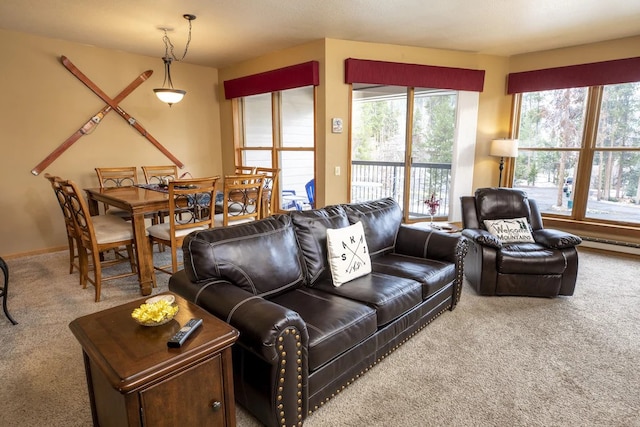 living room with carpet floors and a wealth of natural light