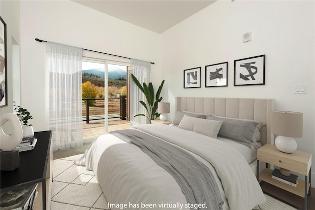 bedroom featuring access to exterior and carpet flooring