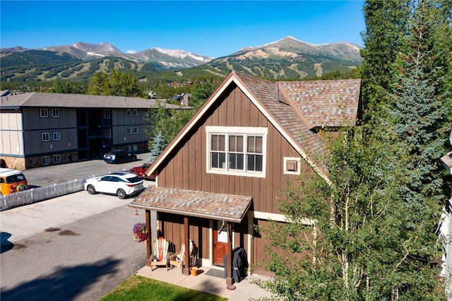 exterior space featuring a mountain view